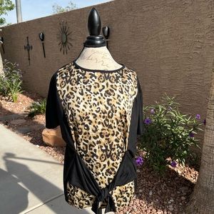 Leopard print top with ties at waist. New without tags. Size L.